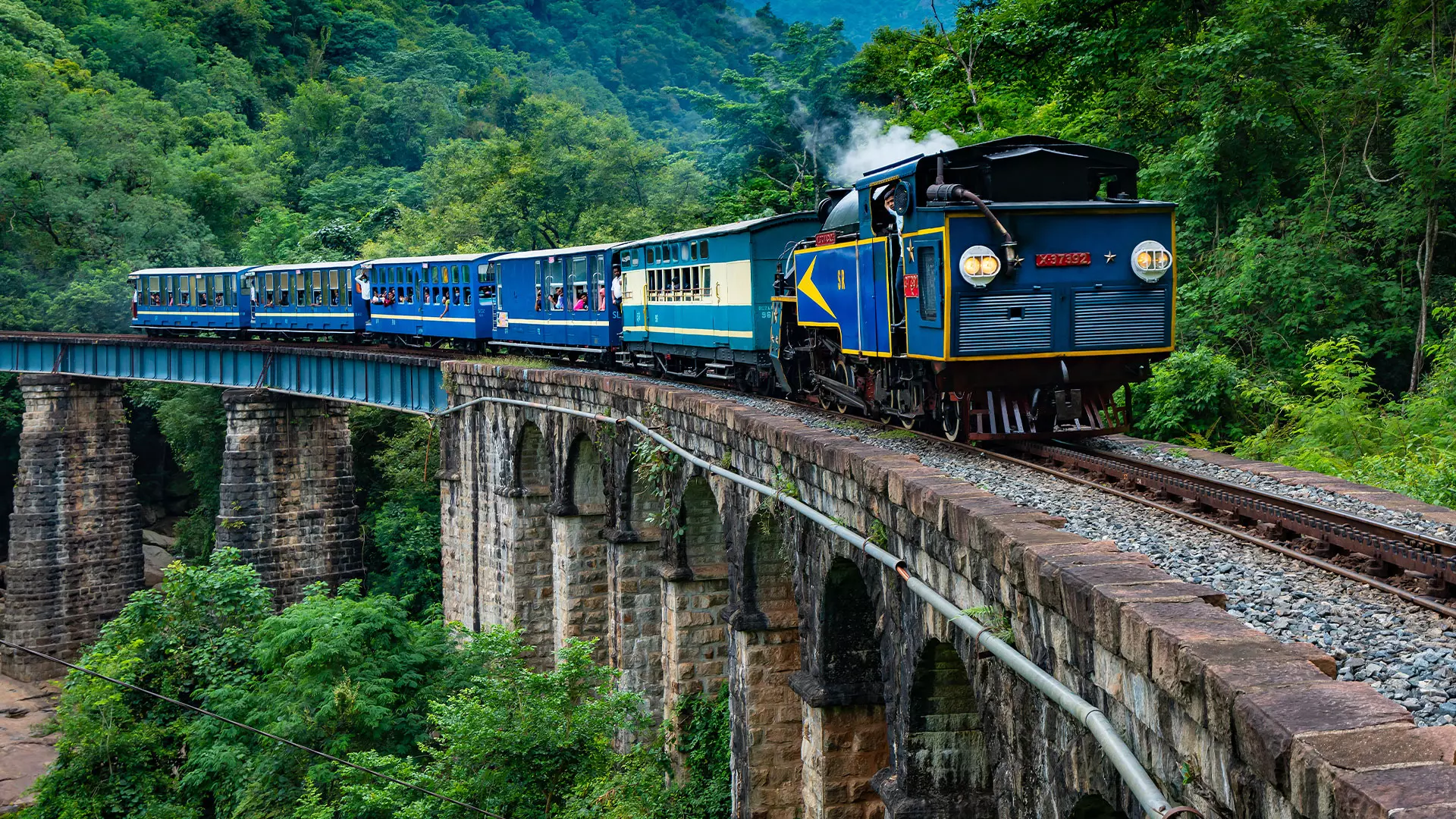 Fog over Nilgiri hills in Ooty during monsoon family holiday packages from bhubaneswar
