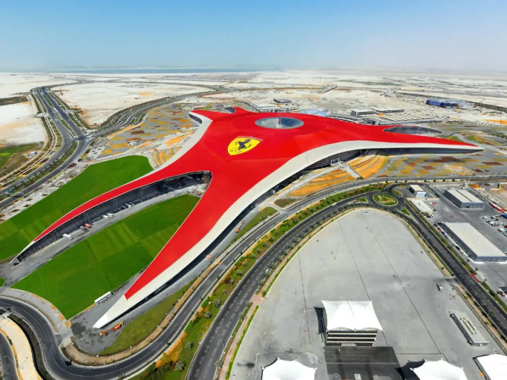 Person planning customized Dubai tour with map and travel brochures